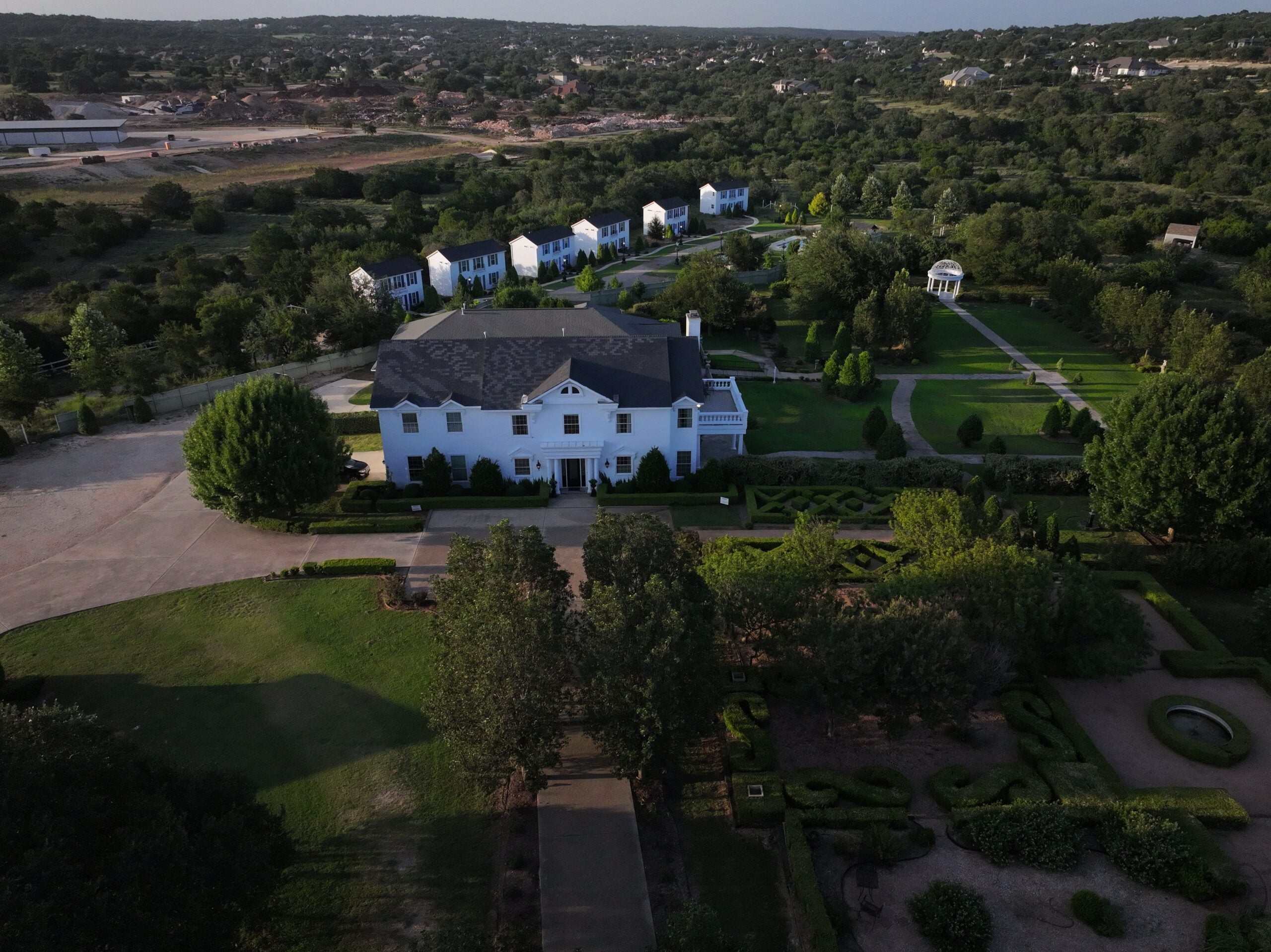 Aerial view of The Gardens of Cranesbury View at dusk